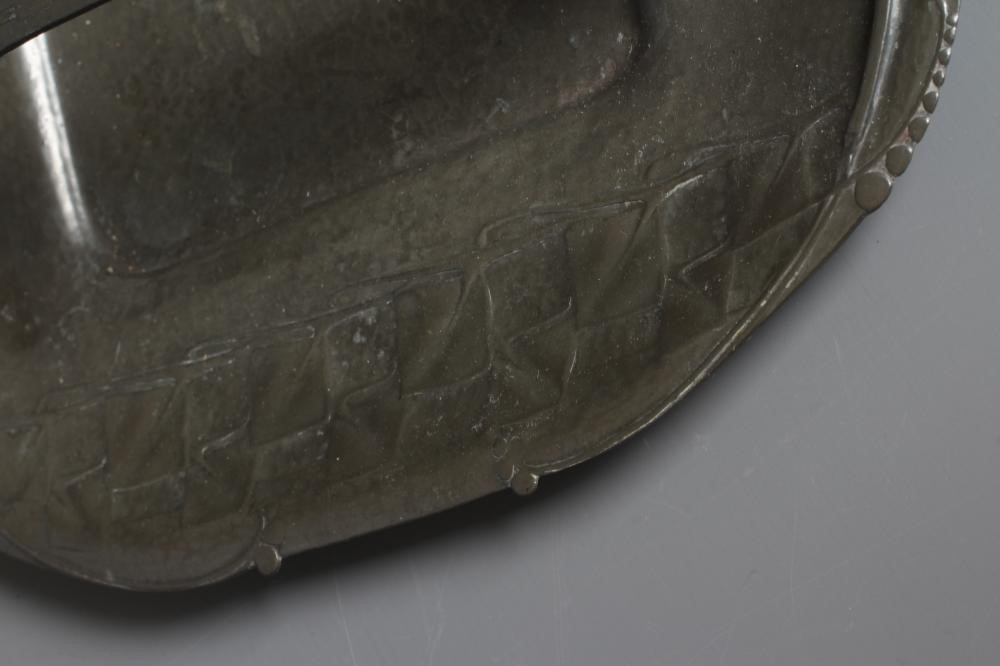 ARCHIBALD KNOX FOR LIBERTY - A TUDRIC PEWTER BASKET of shallow rounded oblong form with fixed Image