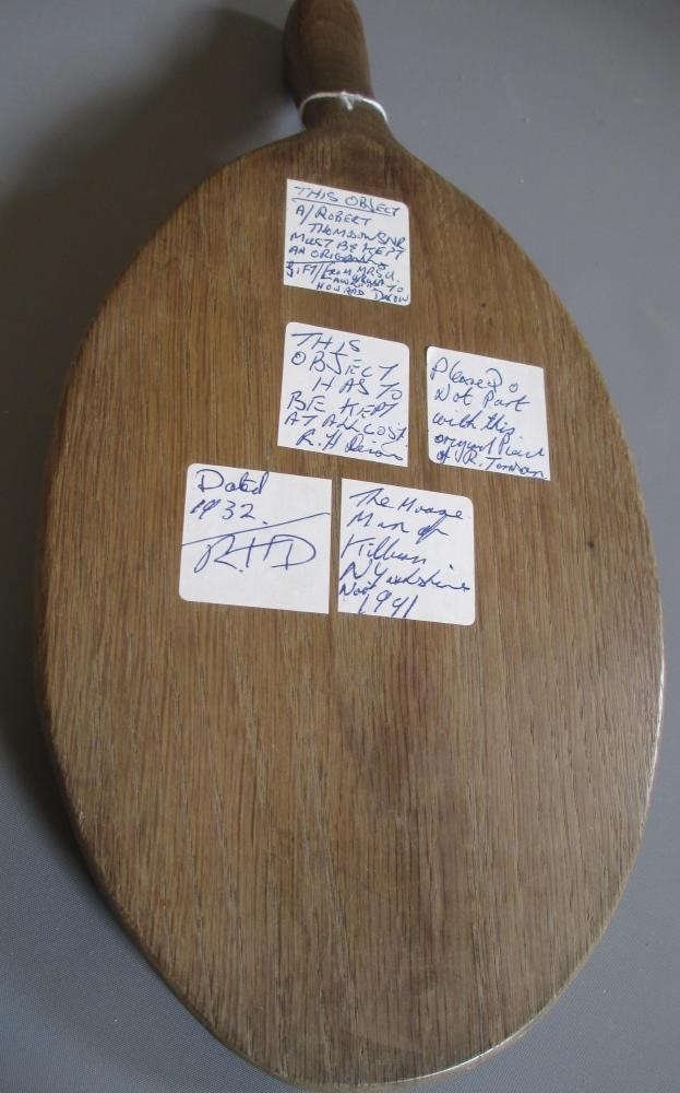 A ROBERT THOMPSON OAK CHEESEBOARD of oval form with carved mouse trademark in high relief, 14 1/2" Image