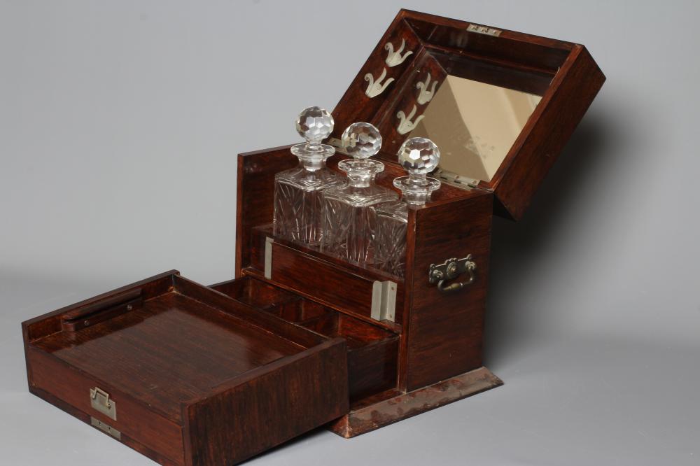 AN EDWARDIAN OAK AND BOXWOOD INLAID TANTALUS/GAMES COMPENDIUM Image