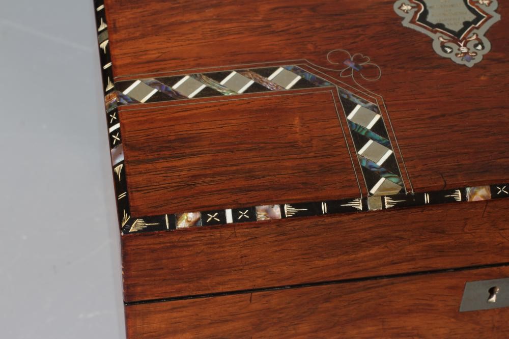 A VICTORIAN ROSEWOOD SEWING AND WRITING BOX Image