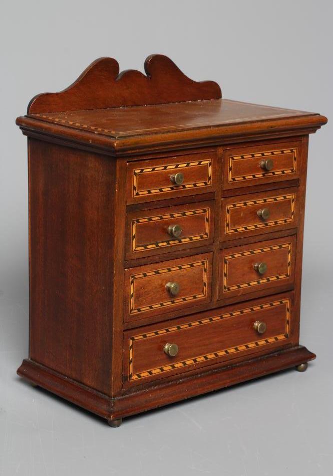 A MAHOGANY AND PARQUETRY BANDED SPECIMEN CHEST Image