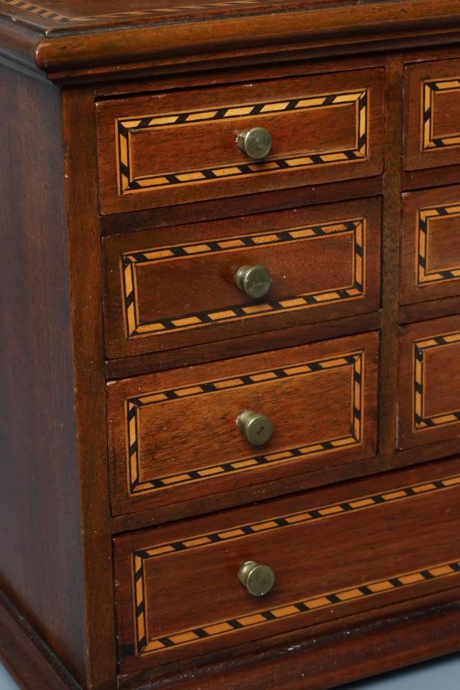 A MAHOGANY AND PARQUETRY BANDED SPECIMEN CHEST Image