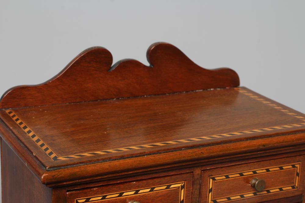 A MAHOGANY AND PARQUETRY BANDED SPECIMEN CHEST Image
