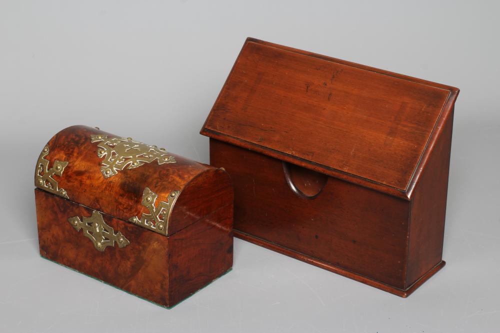 A LATE VICTORIAN MAHOGANY DESKTOP LETTER RACK with three stationery compartments and hinged sloping Image