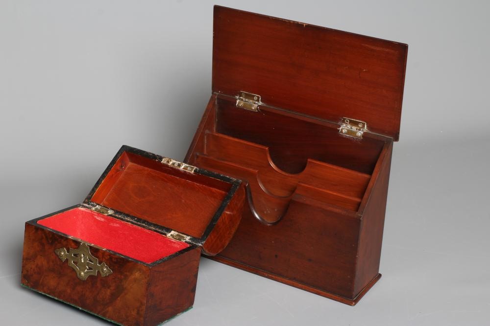 A LATE VICTORIAN MAHOGANY DESKTOP LETTER RACK with three stationery compartments and hinged sloping Image