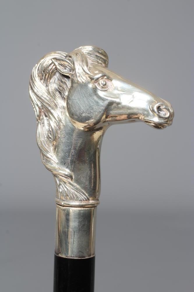A SILVER MOUNTED GREYHOUND HEAD WALKING CANE Image