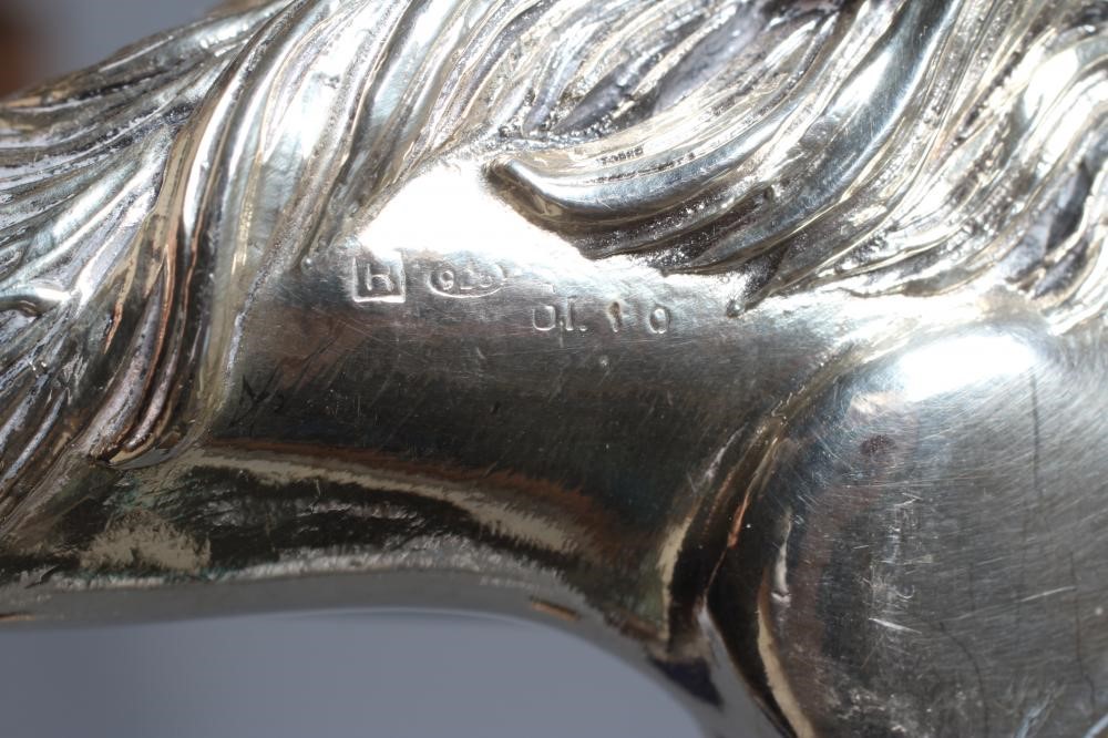 A SILVER MOUNTED GREYHOUND HEAD WALKING CANE Image