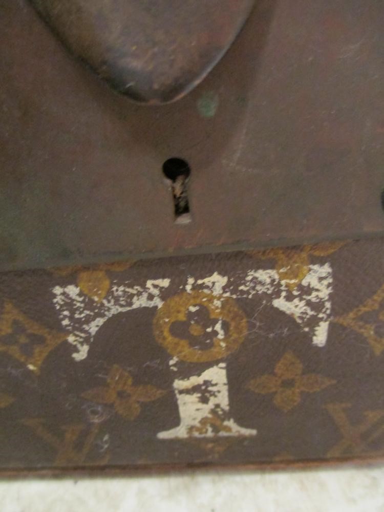 A LOUIS VUITTON LEATHER AND BRASS BOUND ENCYLOPEADIA BRITANNICA LIBRARY TRUNK Image