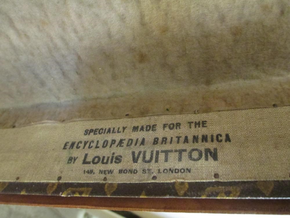 A LOUIS VUITTON LEATHER AND BRASS BOUND ENCYLOPEADIA BRITANNICA LIBRARY TRUNK Image