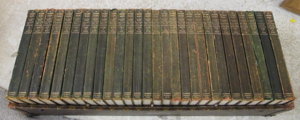 A LOUIS VUITTON LEATHER AND BRASS BOUND ENCYLOPEADIA BRITANNICA LIBRARY TRUNK Image