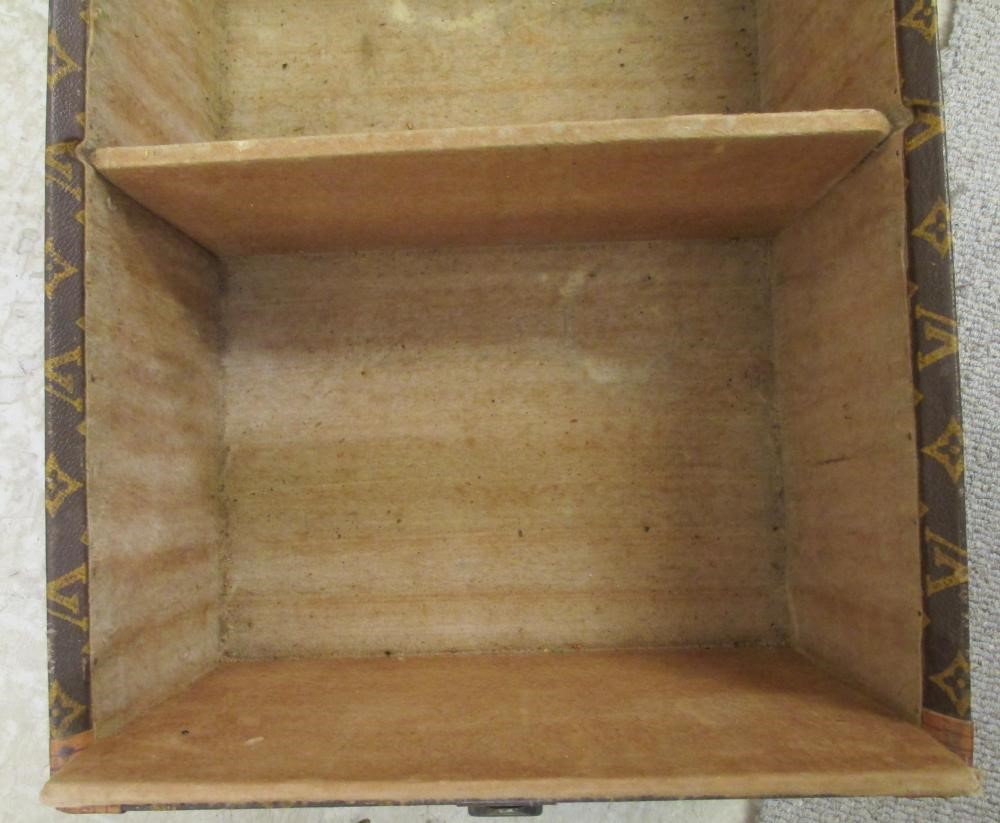 A LOUIS VUITTON LEATHER AND BRASS BOUND ENCYLOPEADIA BRITANNICA LIBRARY TRUNK Image