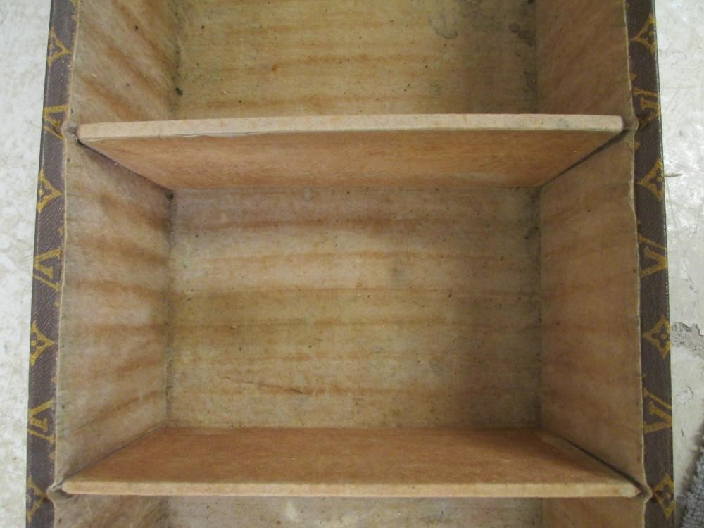 A LOUIS VUITTON LEATHER AND BRASS BOUND ENCYLOPEADIA BRITANNICA LIBRARY TRUNK Image