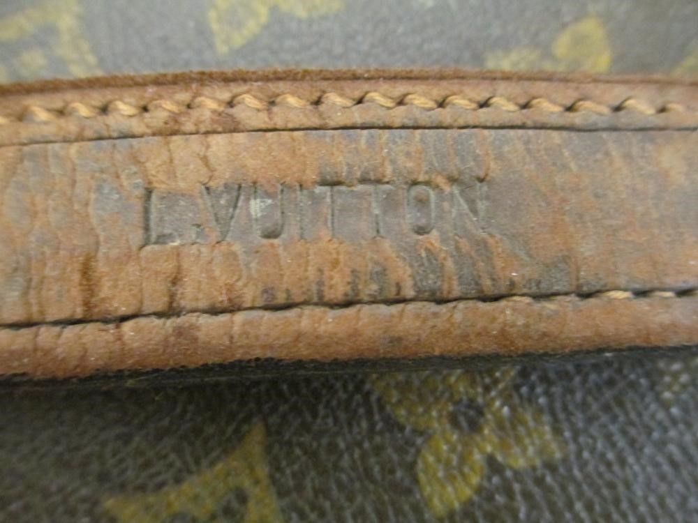 A LOUIS VUITTON LEATHER AND BRASS BOUND ENCYLOPEADIA BRITANNICA LIBRARY TRUNK Image