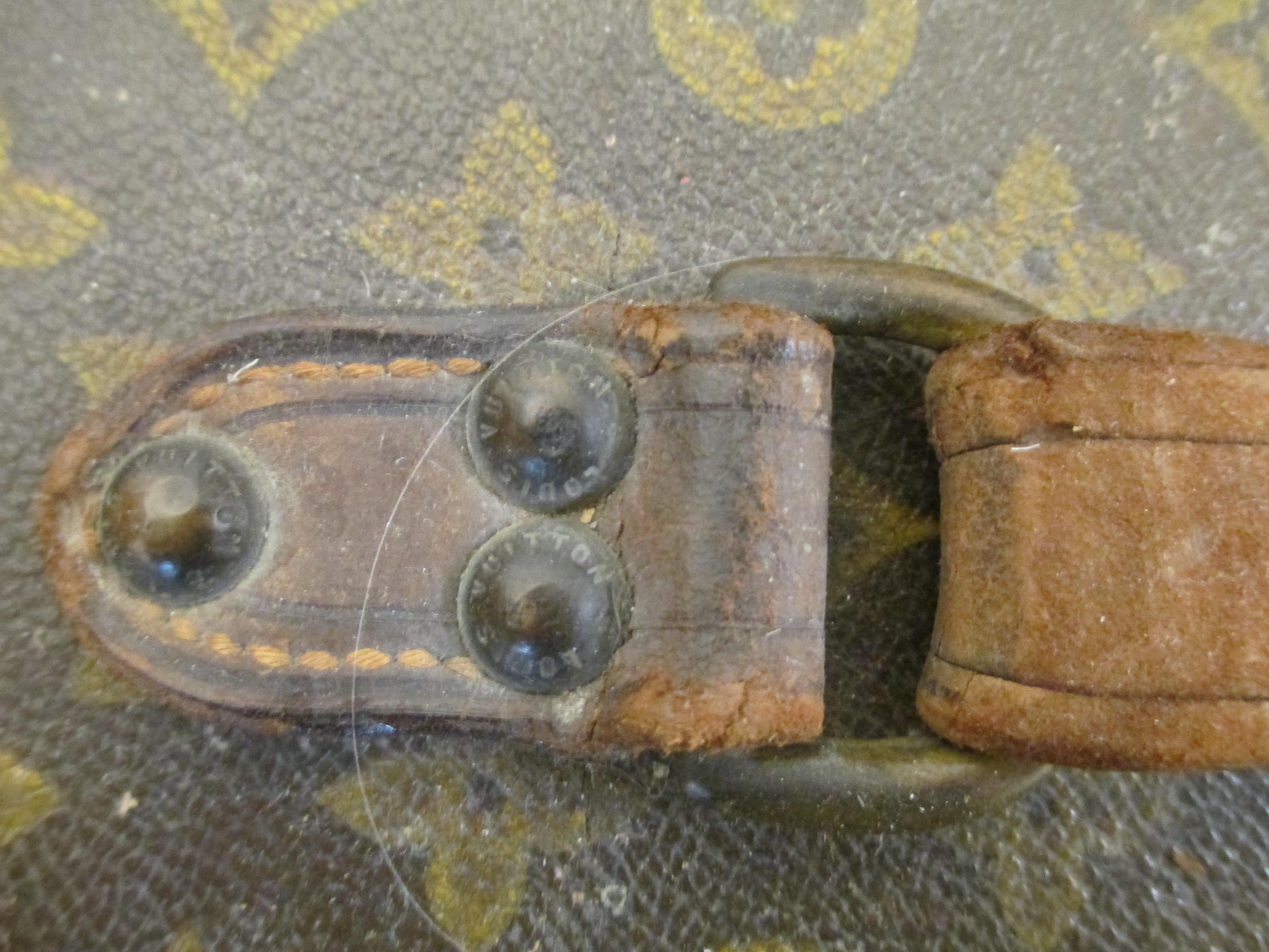 A LOUIS VUITTON LEATHER AND BRASS BOUND ENCYLOPEADIA BRITANNICA LIBRARY TRUNK Image