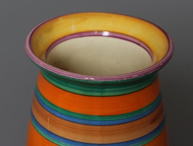 A CLARICE CLIFF BIZARRE POTTERY VASE, 1920's, of bombe cylindrical form, painted with stripes in Image