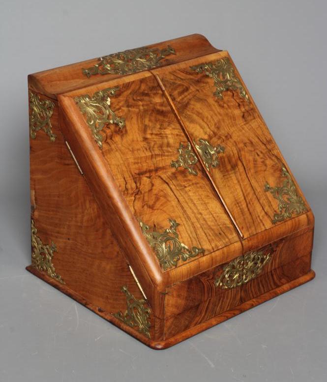 A VICTORIAN BURR WALNUT AND BRASS CORRESPONDENCE BOX with twin sloping doors concealing a fitted Image