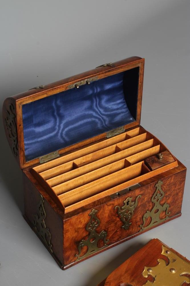 A VICTORIAN WALNUT STATIONERY CASKET of oblong form with brass mounts Image