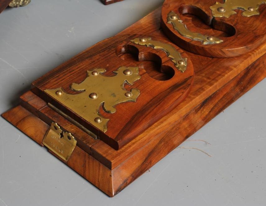 A VICTORIAN WALNUT STATIONERY CASKET of oblong form with brass mounts Image