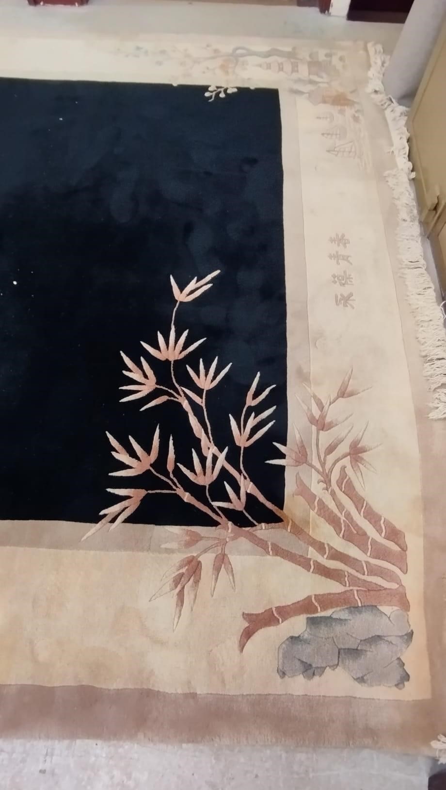 A CHINESE WASHED AND FRINGED CARPET, modern, the black field within a two tone champagne border, Image