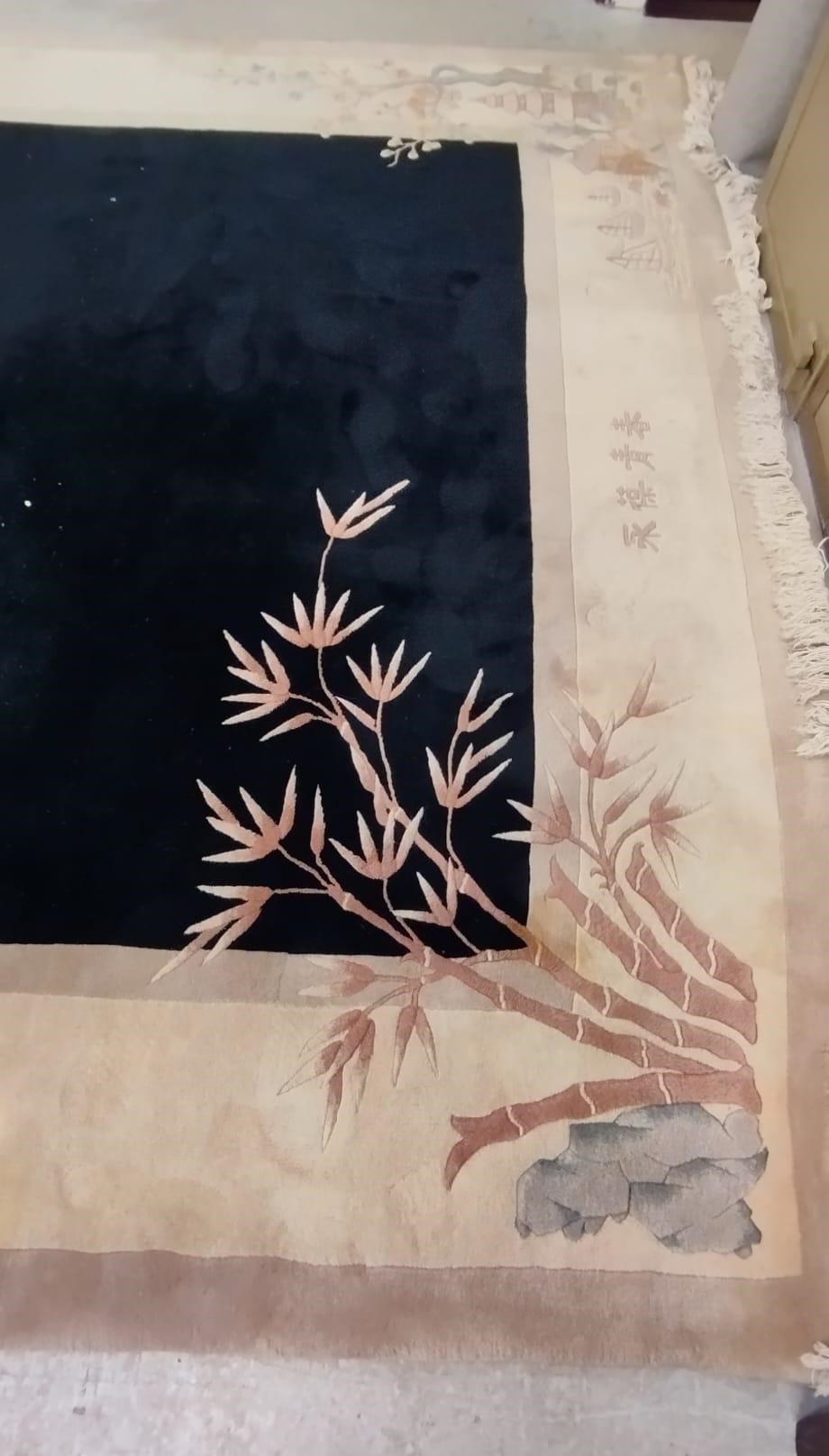 A CHINESE WASHED AND FRINGED CARPET, modern, the black field within a two tone champagne border, Image