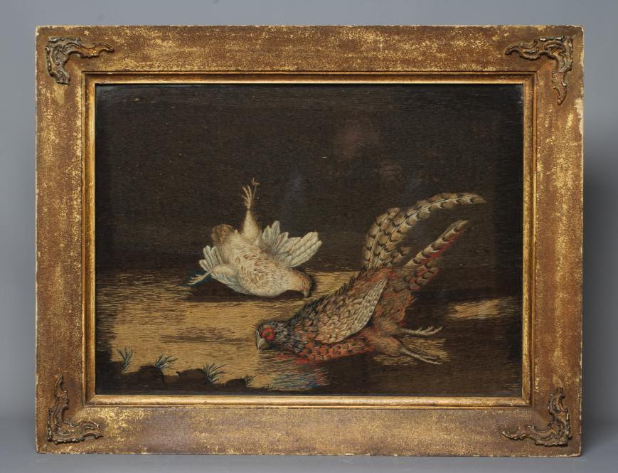A VICTORIAN NEEDLEWORK PANEL worked with a dead cock and hen pheasant on the ground, 17" x 23", Image