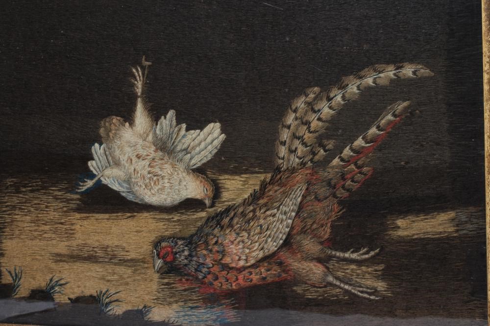 A VICTORIAN NEEDLEWORK PANEL worked with a dead cock and hen pheasant on the ground, 17" x 23", Image