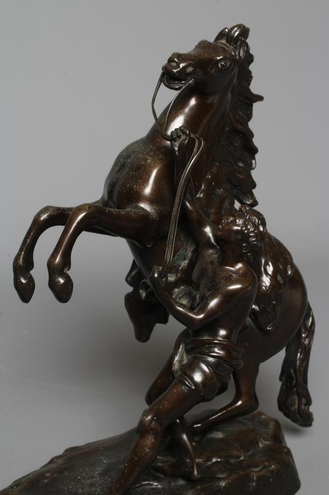 AFTER GUILLAUME COUSTOU THE ELDER (1677-1746) A pair of brown patinated bronze Marly Horses, both Image
