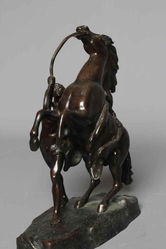 AFTER GUILLAUME COUSTOU THE ELDER (1677-1746) A pair of brown patinated bronze Marly Horses, both Image