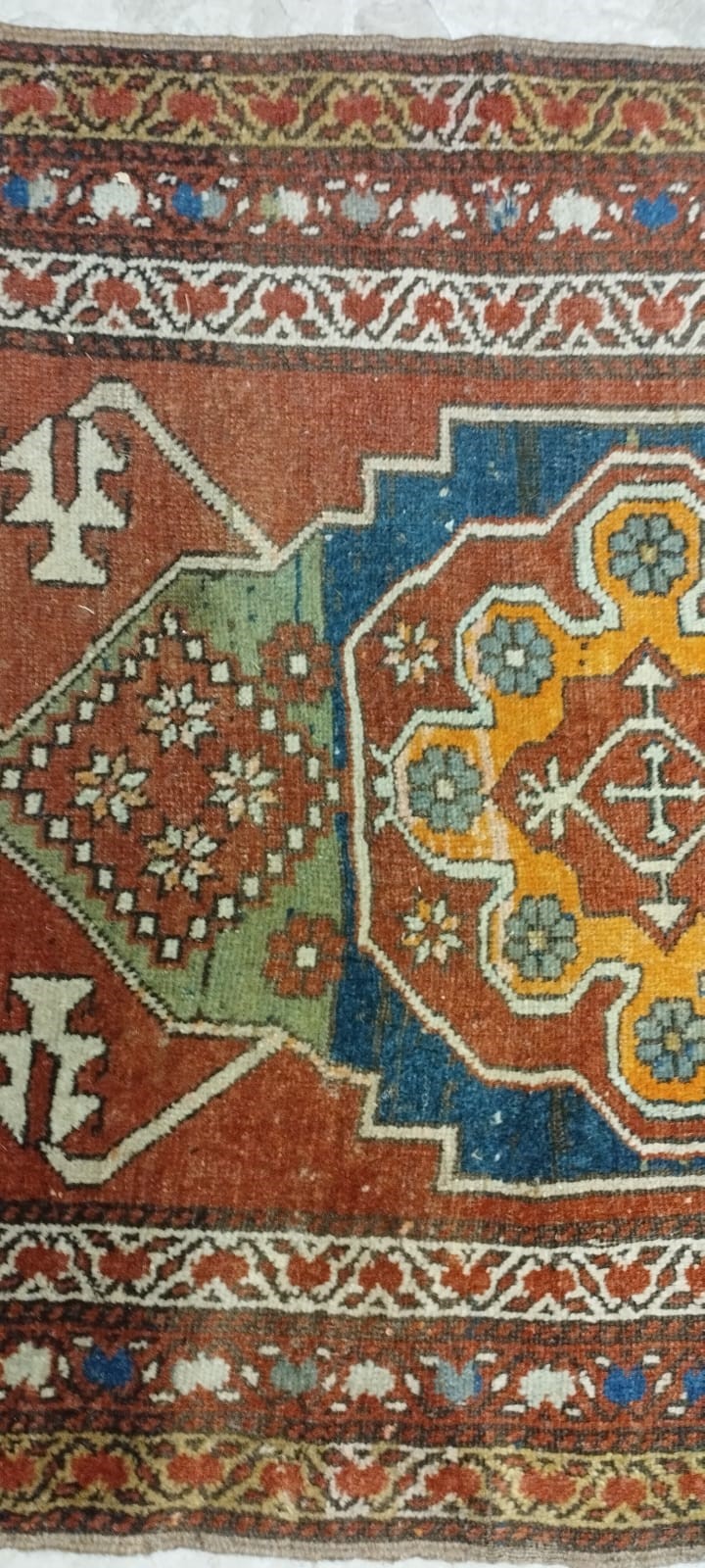 A NORTH WEST PERSIAN RUNNER, c.1900, the madder red field with two guls in shades of blue, red pale Image