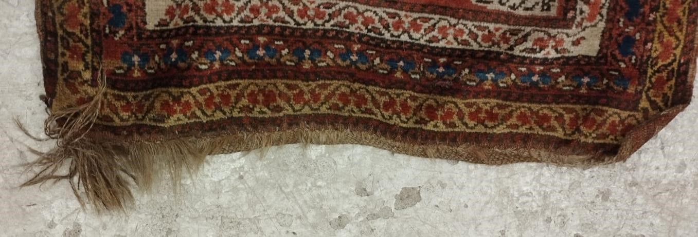 A NORTH WEST PERSIAN RUNNER, c.1900, the madder red field with two guls in shades of blue, red pale Image