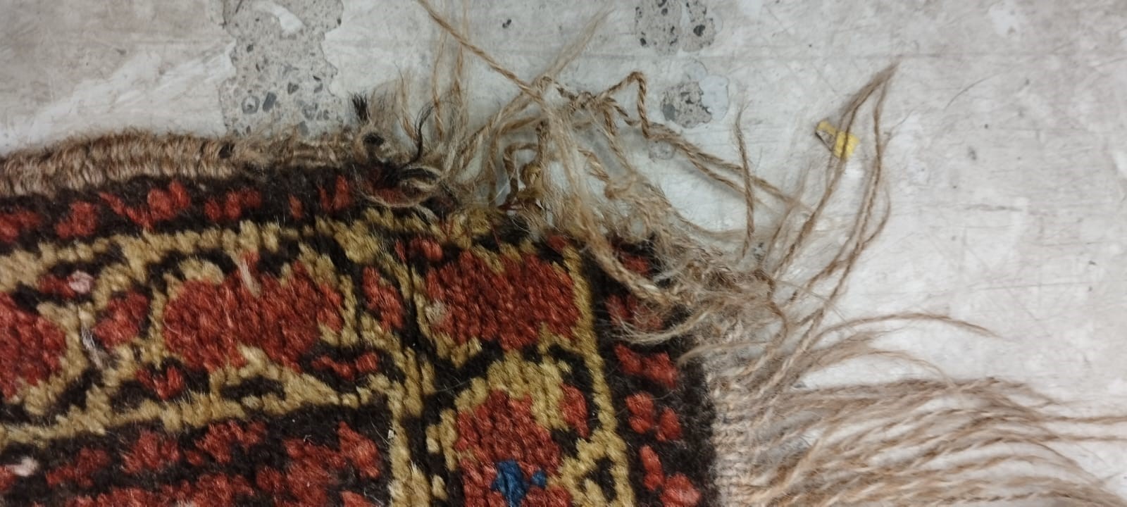 A NORTH WEST PERSIAN RUNNER, c.1900, the madder red field with two guls in shades of blue, red pale Image