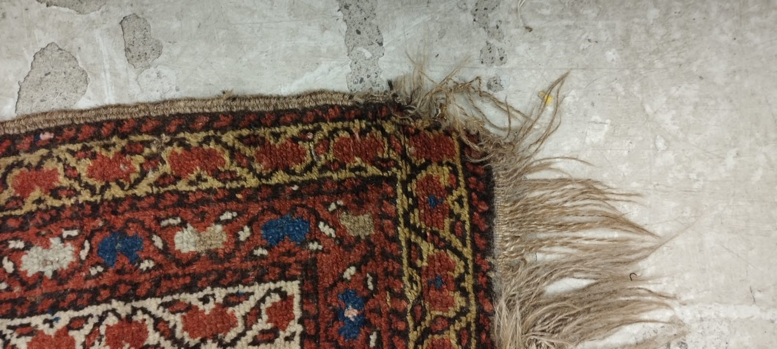 A NORTH WEST PERSIAN RUNNER, c.1900, the madder red field with two guls in shades of blue, red pale Image