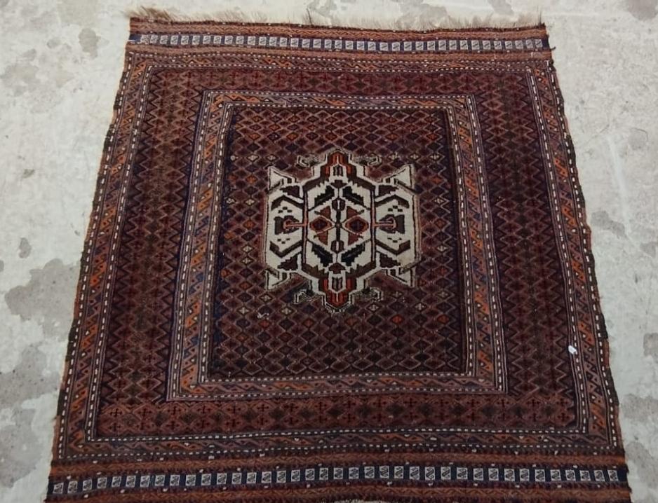A SMALL AFGHAN RUG Image