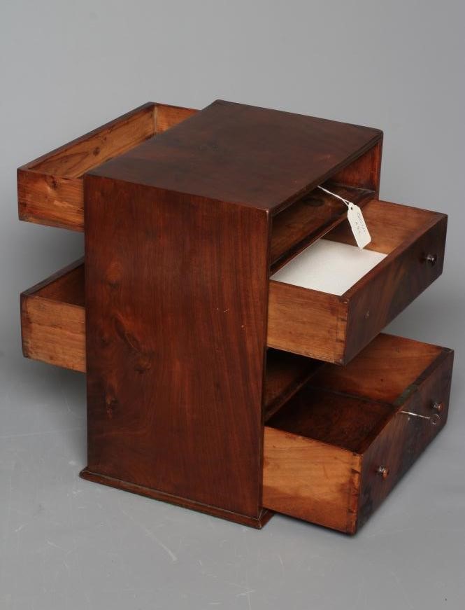 A MAHOGANY MINIATURE DOUBLE SIDED CHEST Image