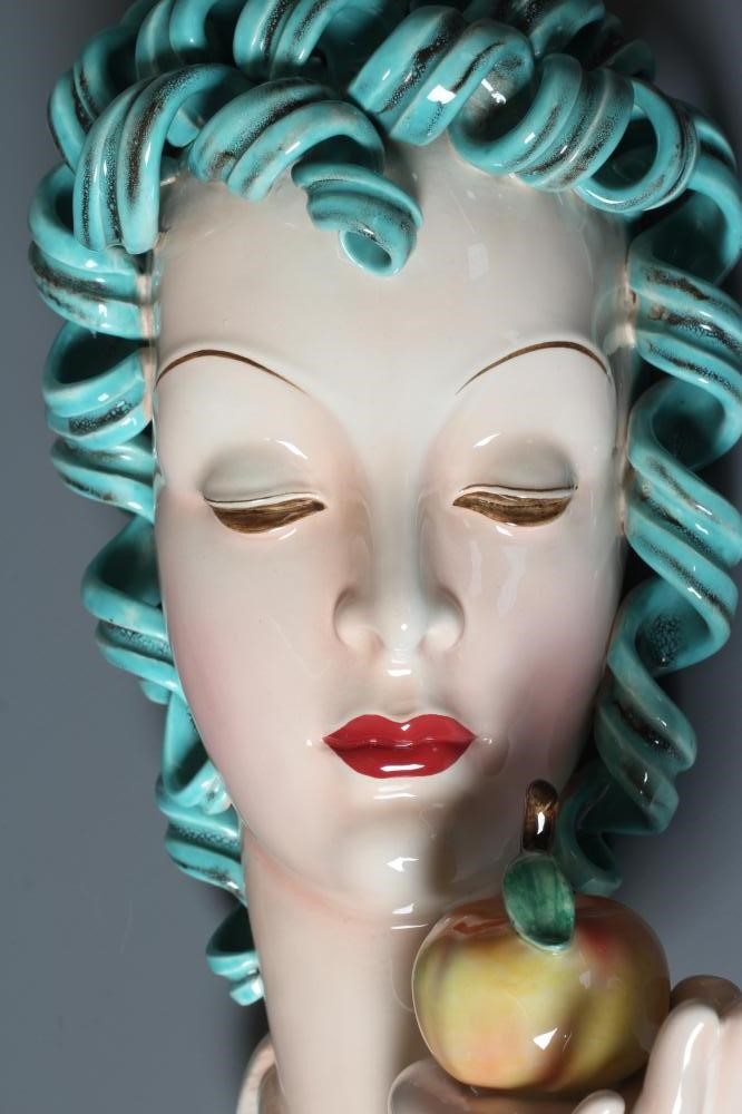 AN ART DECO ROYAL BELVEDERE EARTHENWARE FACE MASK designed by Stephen Dakon as a young lady with Image