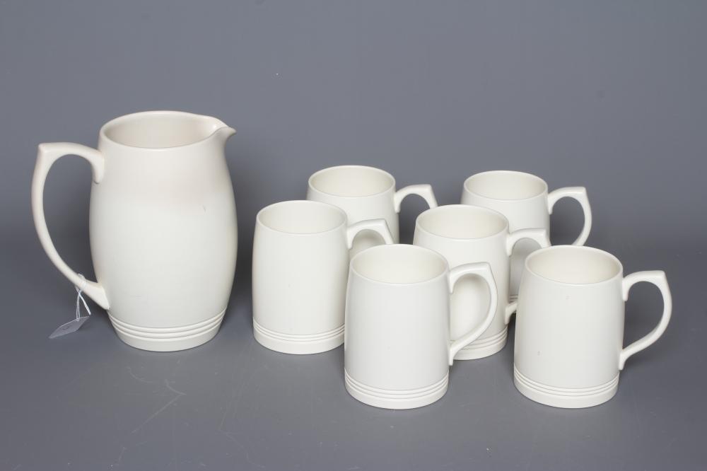 KEITH MURRAY FOR WEDGWOOD - A MOONSTONE LEMONADE SET comprising six mugs and a jug Image