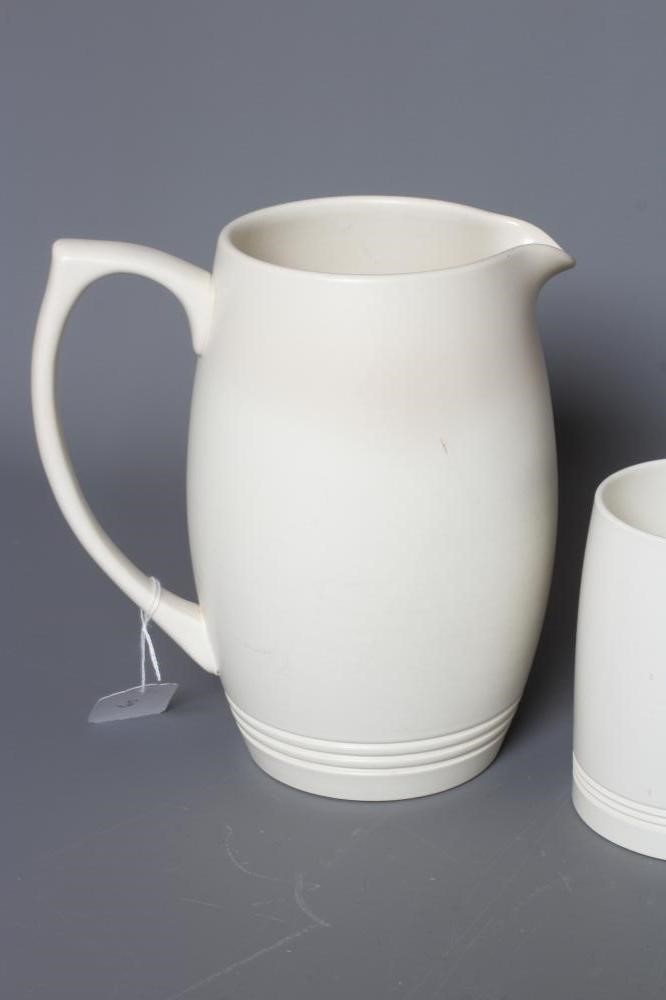 KEITH MURRAY FOR WEDGWOOD - A MOONSTONE LEMONADE SET comprising six mugs and a jug Image