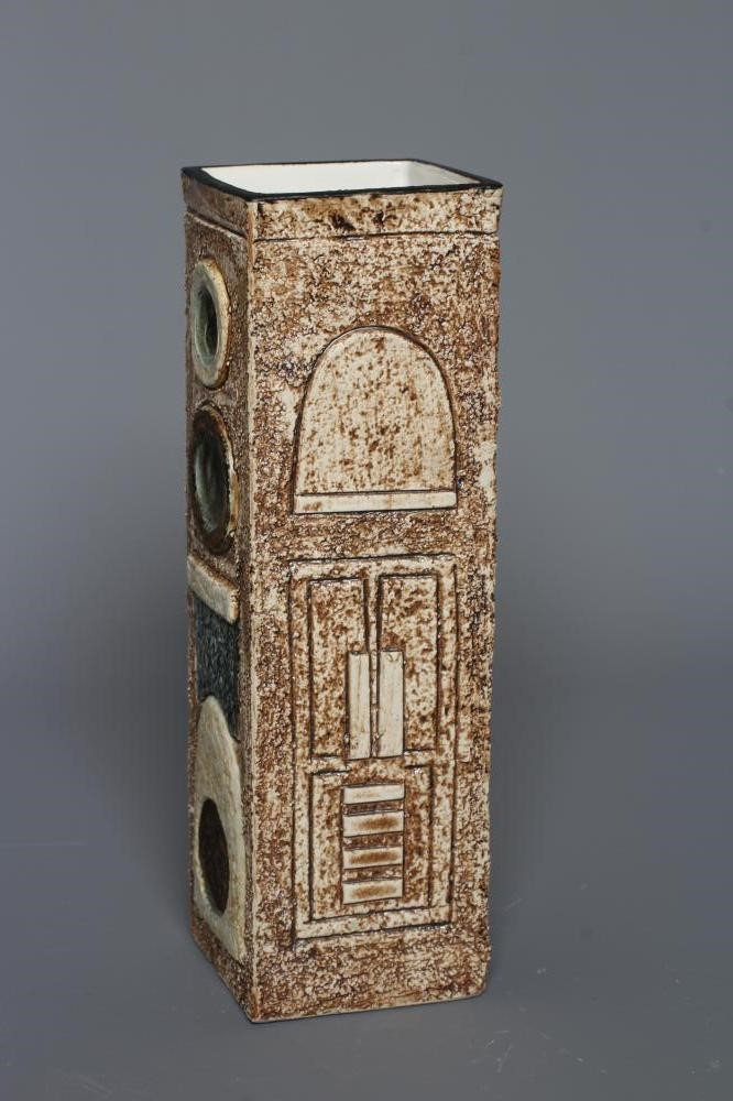 A TROIKA VASE by Avril Bennett, of plain square section, decorated in shades of brown and blue with Image
