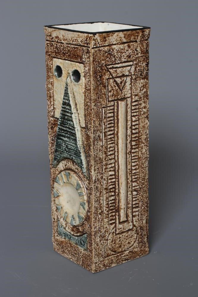 A TROIKA VASE by Avril Bennett, of plain square section, decorated in shades of brown and blue with Image