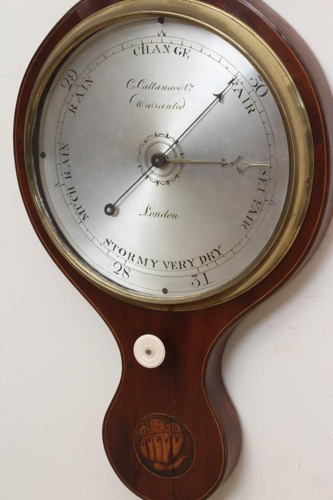 A GEORGIAN MAHOGANY WHEEL BAROMETER Image