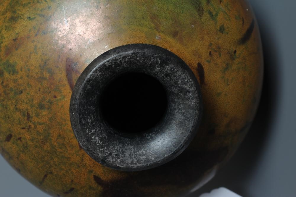 ANDREW HILL (b.1964) A TALL STONEWARE VASE of flared rounded form with mottled bronze, copper and Image