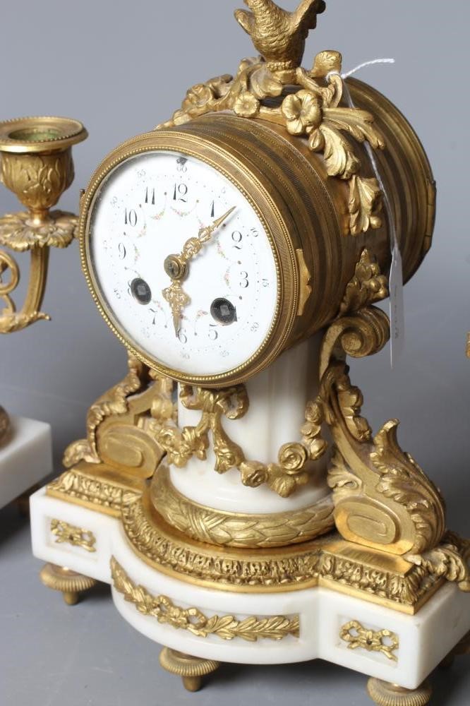 A FRENCH WHITE MARBLE MANTEL CLOCK by Samuel Marti Paris Image