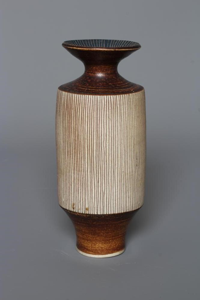 DAME LUCIE RIE DBE (1902-1995) A PORCELAIN VASE of cylindrical section with waisted neck and flared Image