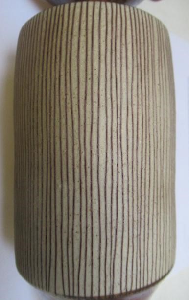 DAME LUCIE RIE DBE (1902-1995) A PORCELAIN VASE of cylindrical section with waisted neck and flared Image