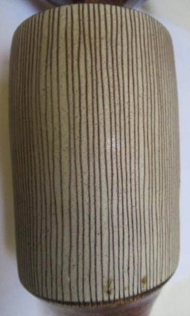DAME LUCIE RIE DBE (1902-1995) A PORCELAIN VASE of cylindrical section with waisted neck and flared Image
