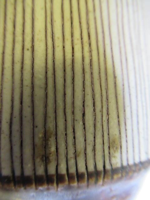 DAME LUCIE RIE DBE (1902-1995) A PORCELAIN VASE of cylindrical section with waisted neck and flared Image