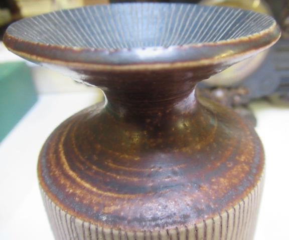 DAME LUCIE RIE DBE (1902-1995) A PORCELAIN VASE of cylindrical section with waisted neck and flared Image