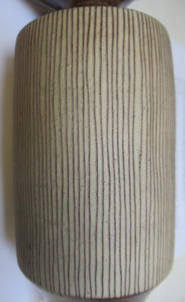 DAME LUCIE RIE DBE (1902-1995) A PORCELAIN VASE of cylindrical section with waisted neck and flared Image