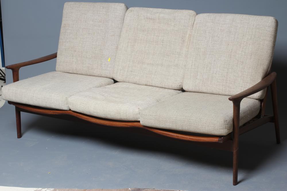 A TEAK FRAMED LOUNGE SUITE probably Guy Rogers New York Image