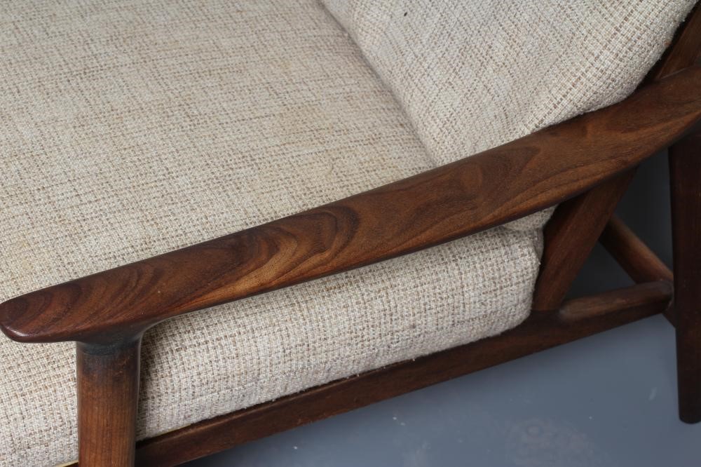 A TEAK FRAMED LOUNGE SUITE probably Guy Rogers New York Image